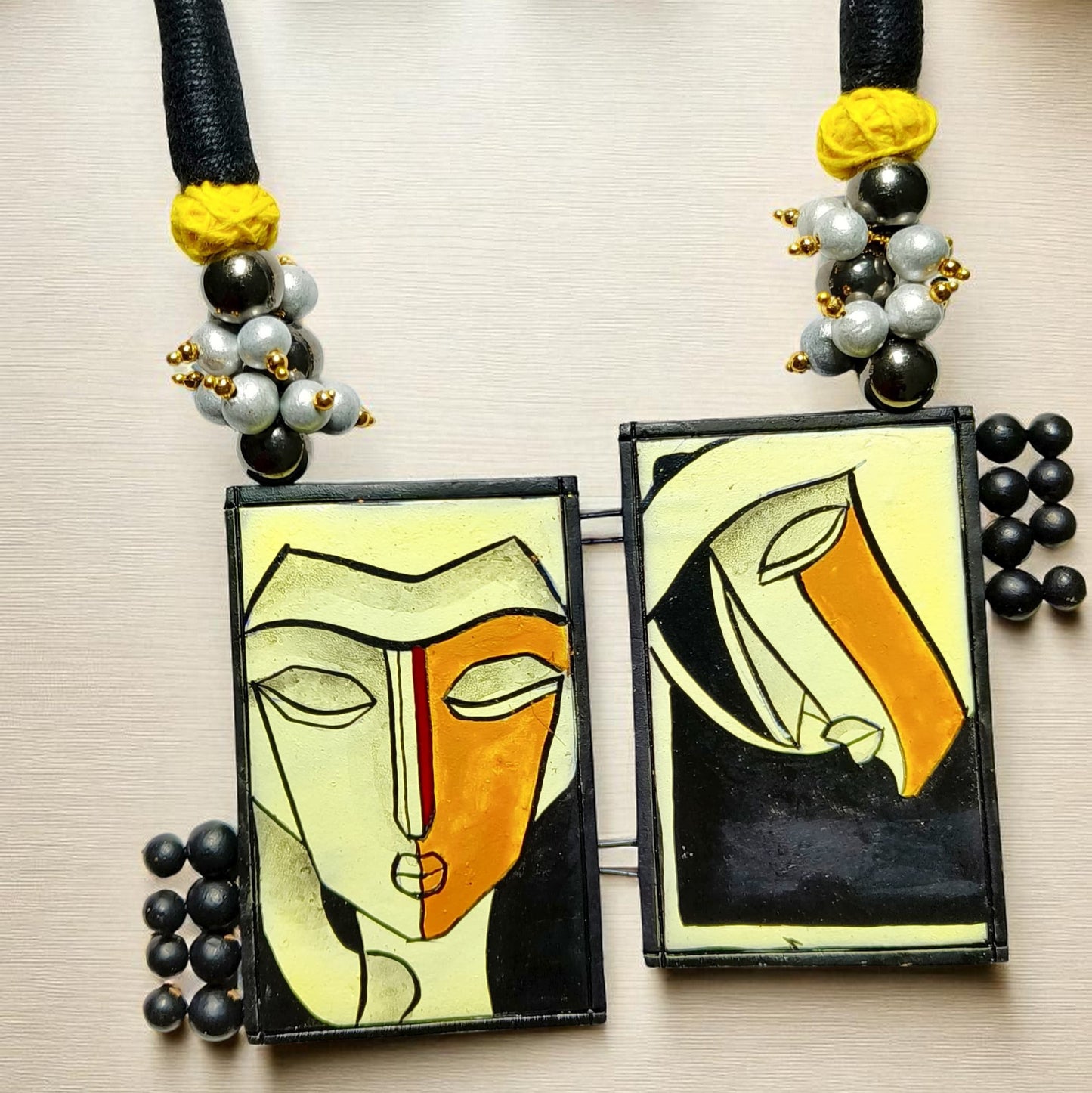 ASTRIA JEWELLERY hand crafted dual pendant necklace with abstract face art and matching earrings