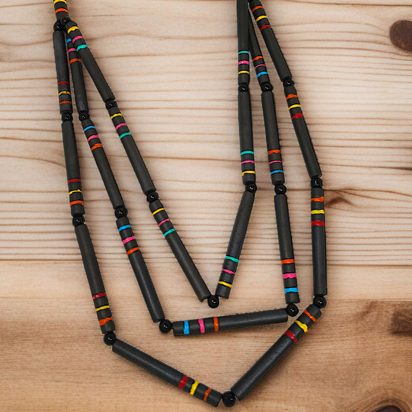 Terracotta Beaded Necklace with Earrings for Women Black Handmade Necklace by ASTRIA JEWELLERY displayed on wooden surface