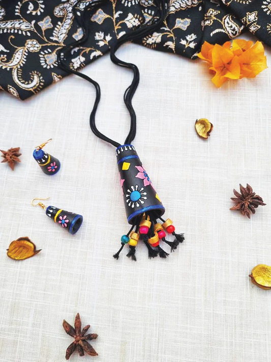 Affordable Handmade Cone Terracotta Pendant and Earring set with colorful floral designs on black background