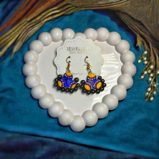 Blue yellow ethnic earrings with decorative black bead accents by Mrritika By Astria Jewellery
