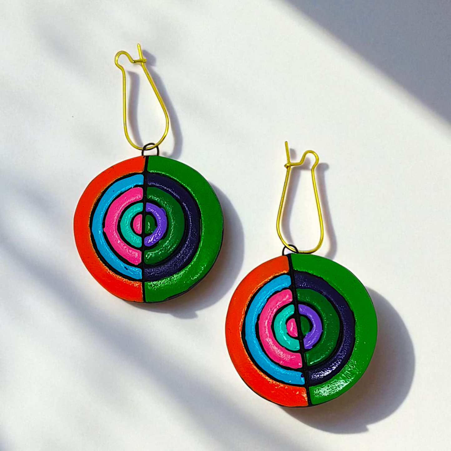Hand made Geometrical Terracotta Necklace Set featuring colorful circular terracotta earrings with gold hooks