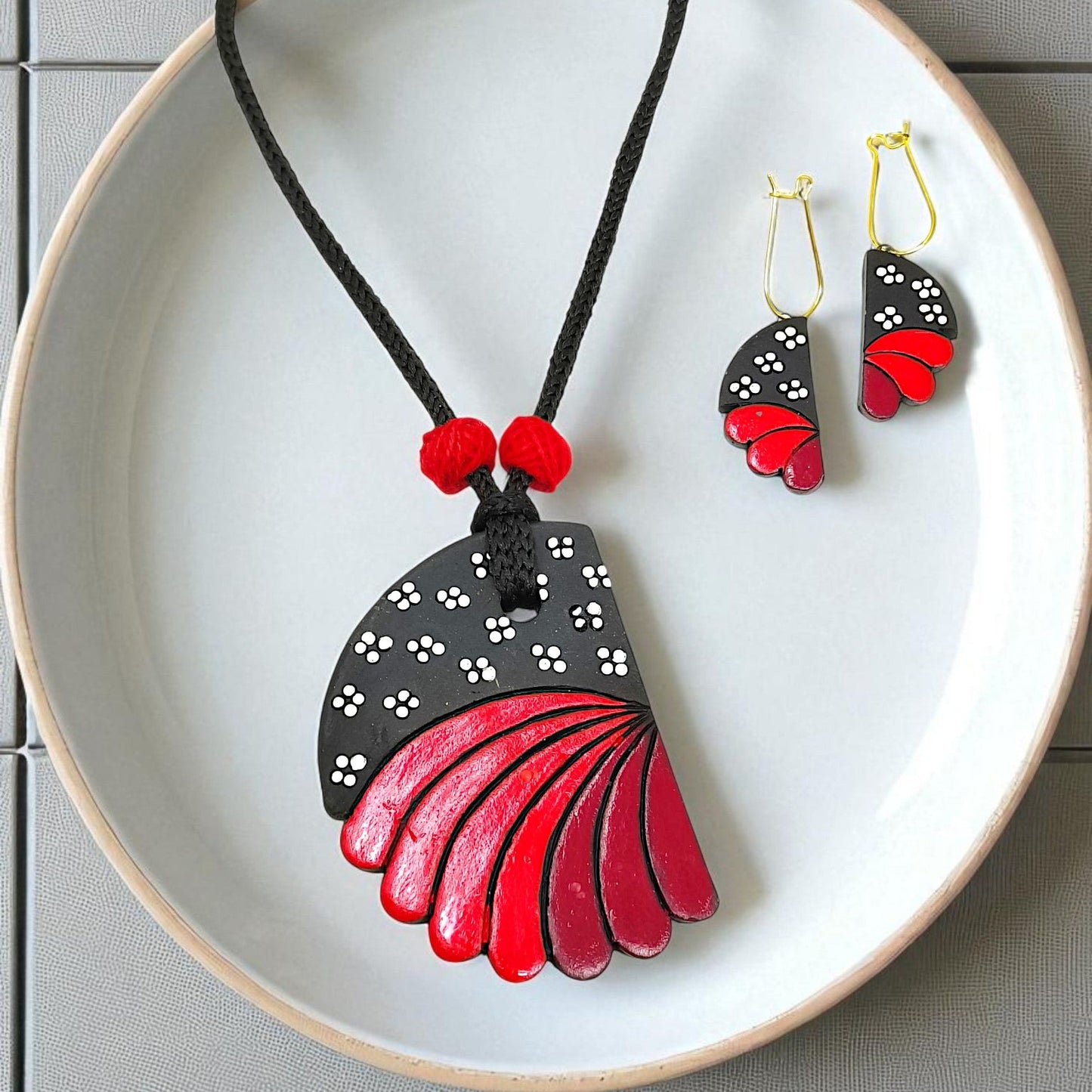 Indian ethnic jewelry set with black and red painted wooden pendant and matching earrings