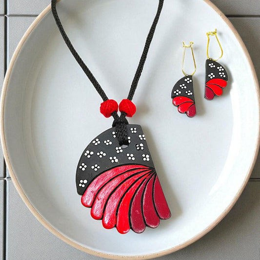 Indian ethnic jewelry set with black and red painted wooden pendant and matching earrings
