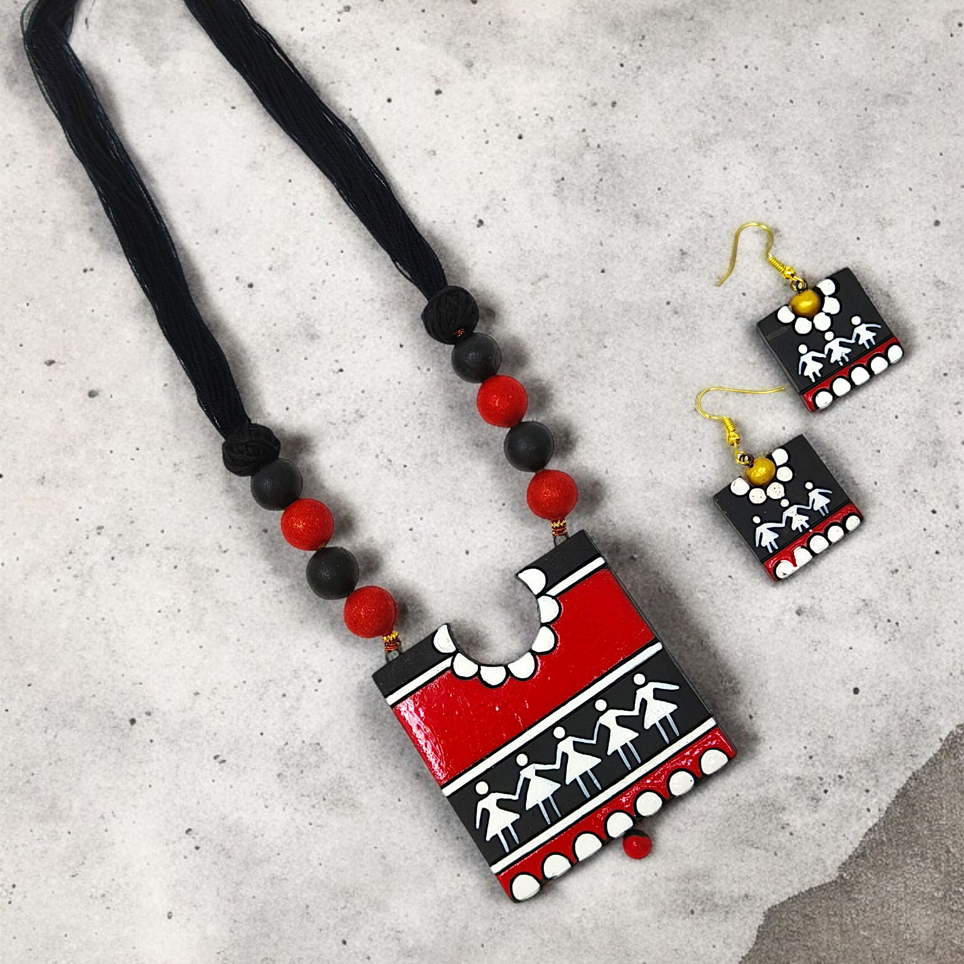 Handcrafted Warli Art Pendent and Earring set with red black white tribal design from Mrritika Handmade Jewelry 