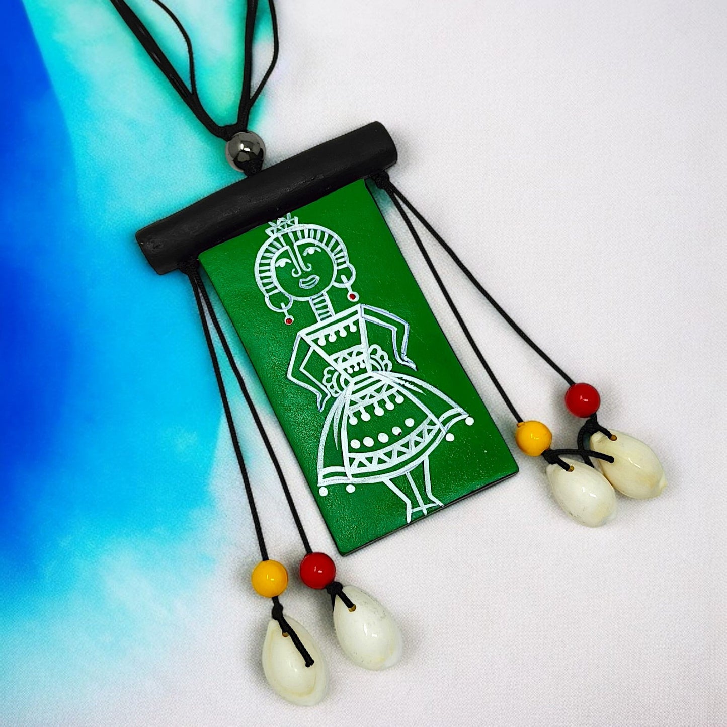 Handmade Folk Art Jewelry Neckpiece with green rectangular pendant and white tribal design by ASTRIA JEWELLERY