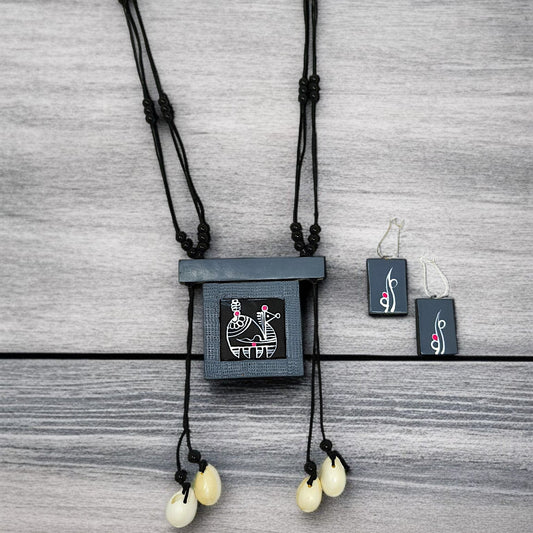 Handmade tribal necklace for women with black pendant and matching earrings by ASTRIA JEWELLERY