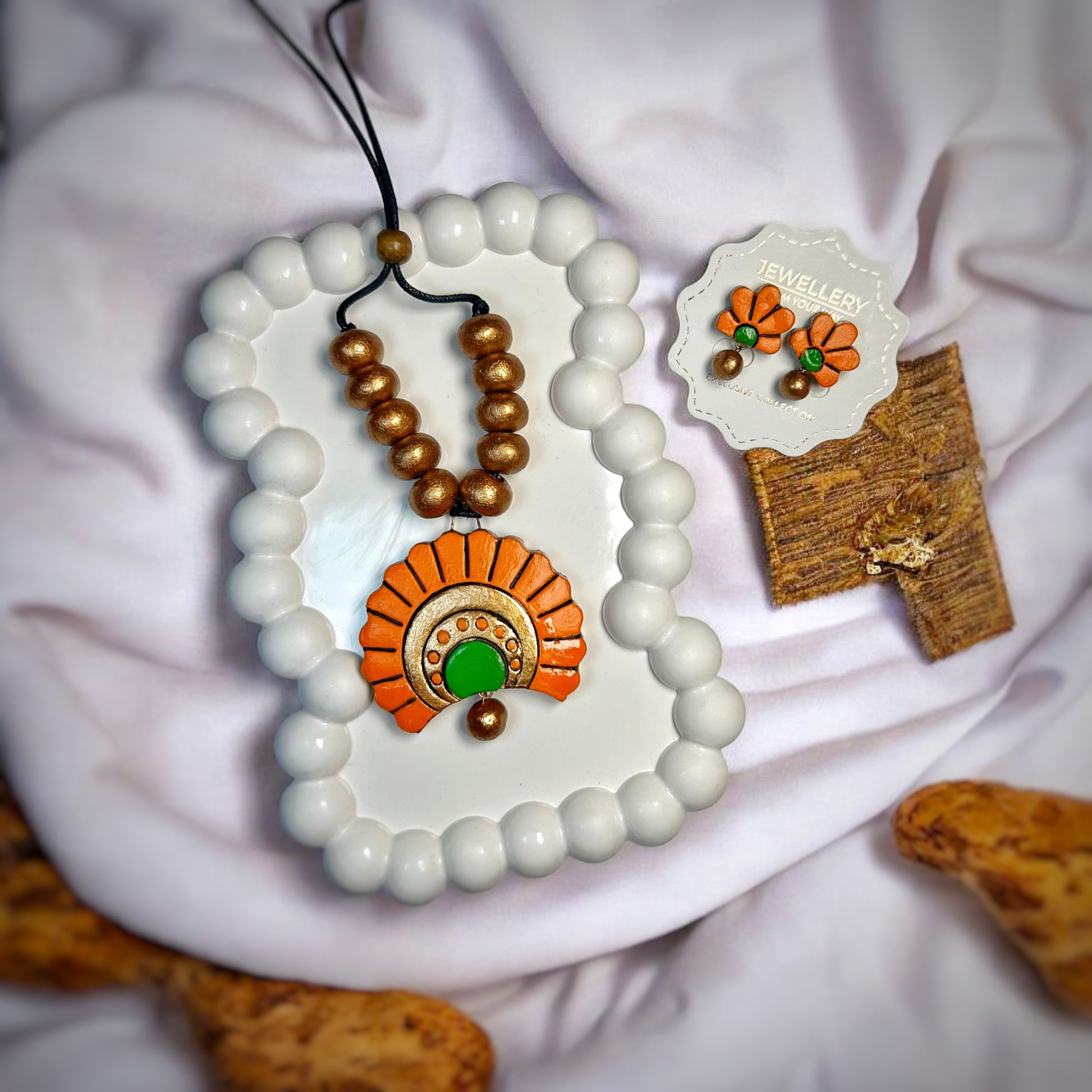 ASTRIA JEWELLERY modern boho jewelry India orange and green pendant necklace with matching earrings  