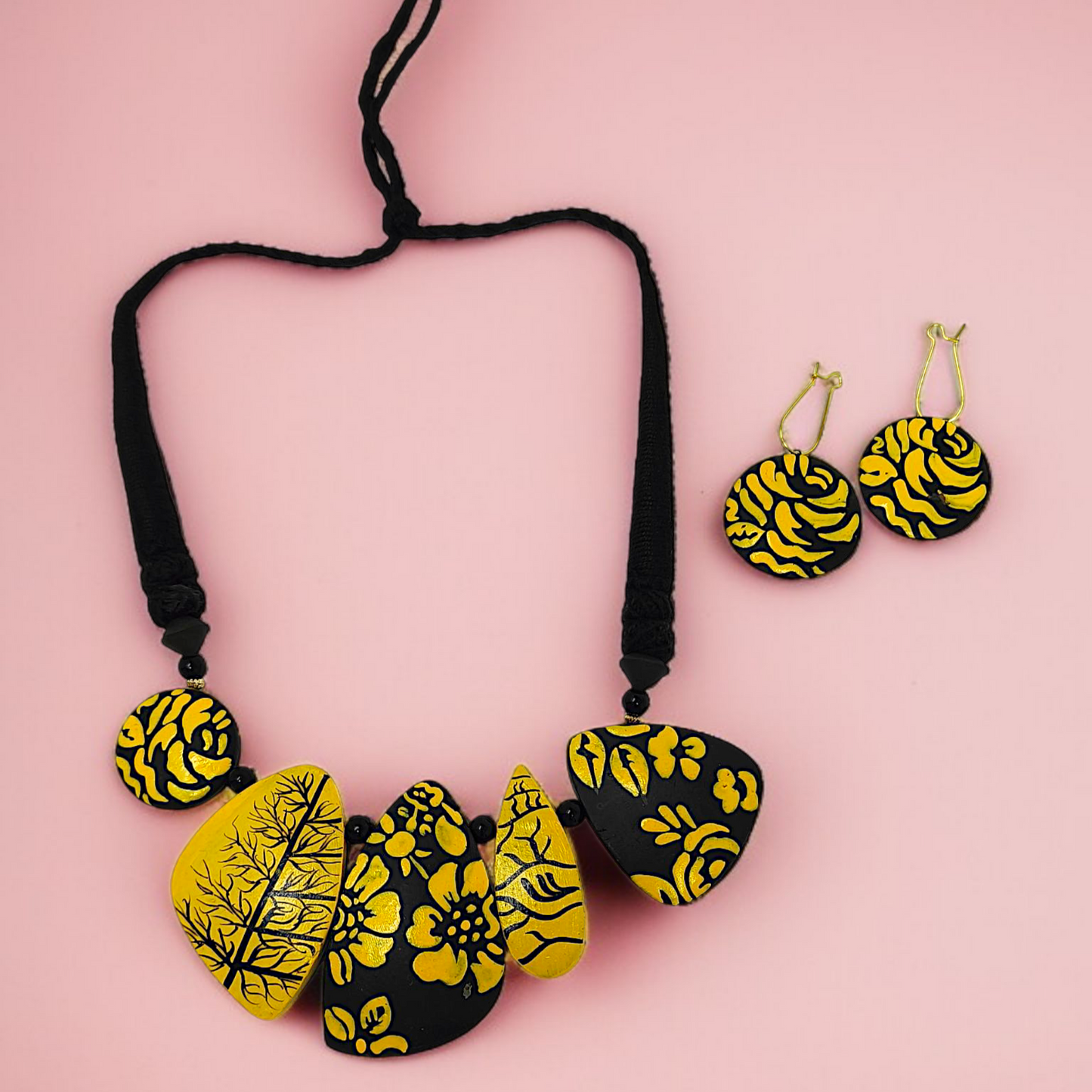 Mrittika Handmade Tribal Clay Choker With Earring in yellow and black floral design by ASTRIA JEWELLERY
