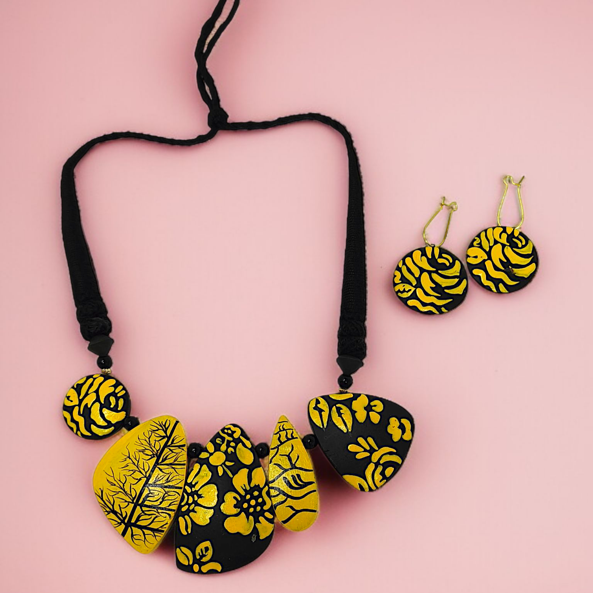 Mrittika Handmade Tribal Clay Choker With Earring in yellow and black floral design by ASTRIA JEWELLERY