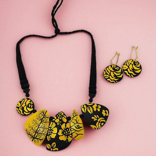 Mrittika Handmade Tribal Clay Choker With Earring in yellow and black floral design by ASTRIA JEWELLERY