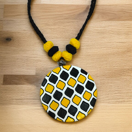 Sun Shape Minimal Handmade Terracotta Necklace with Earring featuring black and yellow beads and a round pendant with geometric patterns