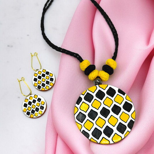 Sun Shape Minimal Handmade Terracotta Necklace with Earring featuring black and yellow geometric design on a black braided cord