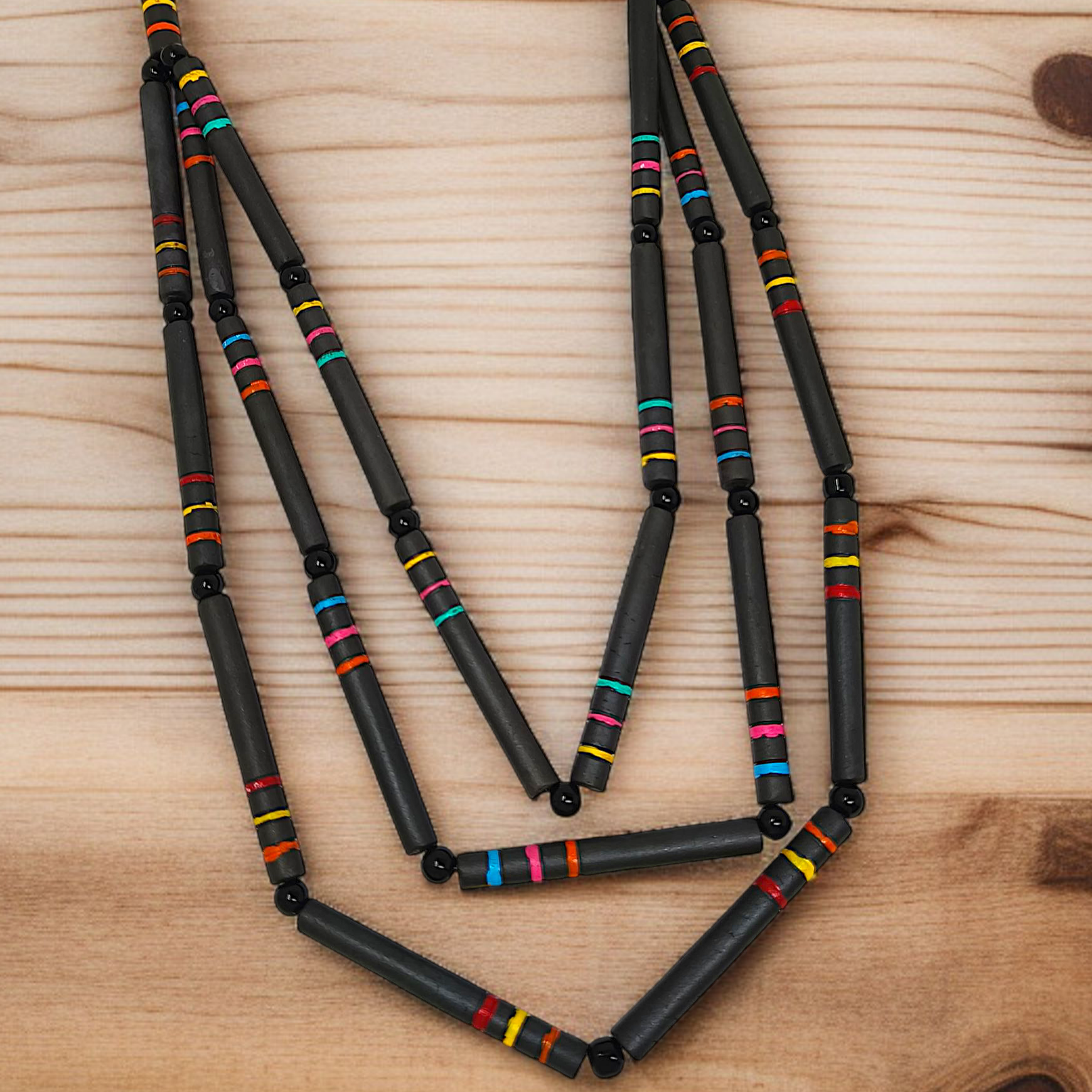 Terracotta Beaded Necklace with Earrings for Women Black Handmade Necklace by ASTRIA JEWELLERY displayed on wooden surface