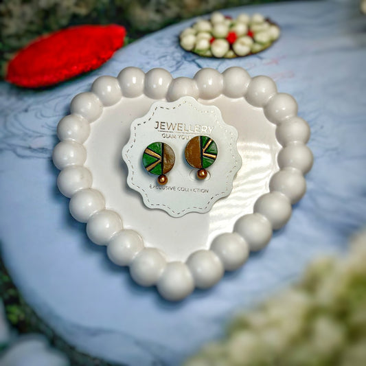 Terracotta Circle Earrings Green displayed on white bead heart-shaped tray by Mrritika