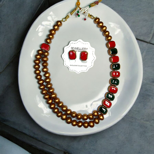 Terracotta Royal Pattern Necklace and Earring Handmade Jewelry Set by Mrritika with red green beads and gold finish