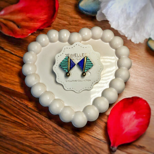 Turquoise Check Handmade Earrings by Mrritika displayed on a decorative heart-shaped tray with flower petals