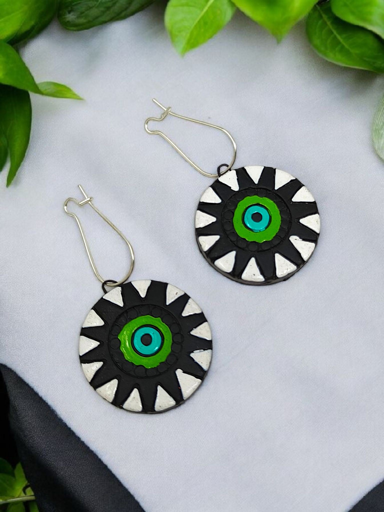 Unison Green Sun Terracotta Pendant with Earring featuring black white and green sun design with silver hooks
