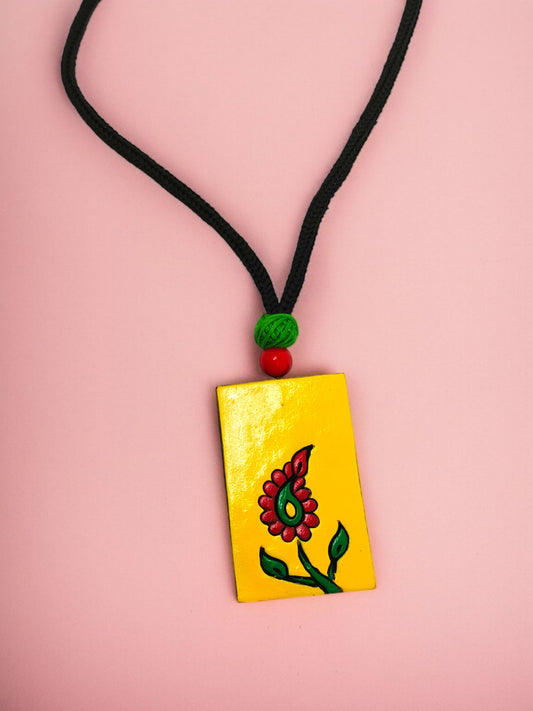 Mrritika yellow rectangular pendant necklace with red flower design and black cord